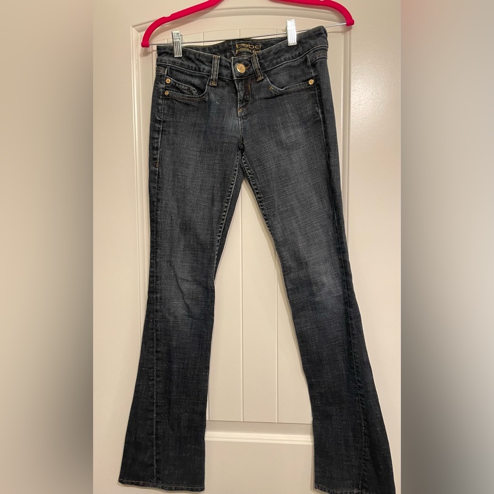 Bebe Dark Denim, slight flare. Size 26.